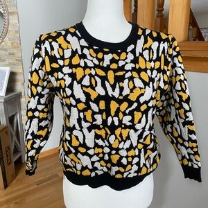 Black, White, and Yellow Patterned Crop Sweater